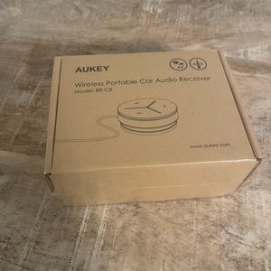 brand new unopened AUKEY wireless portable car bluetooth